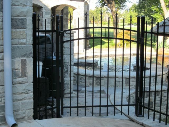 iron gate - wrought iron gate leading to pool area